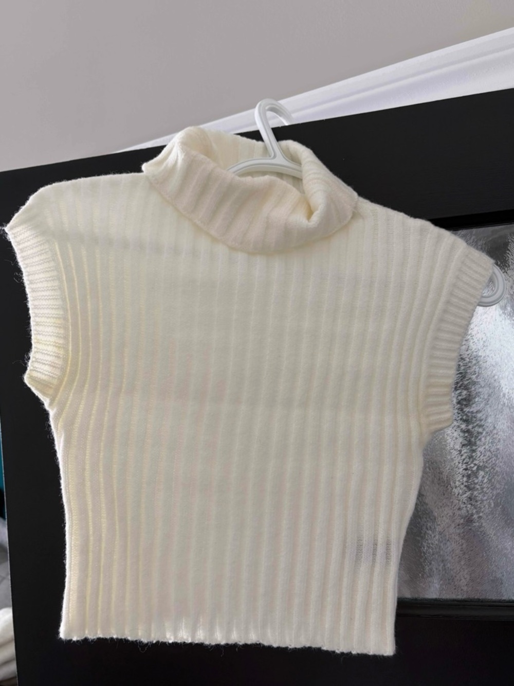 Cream Ribbed Sleeveless Turtleneck Sweater